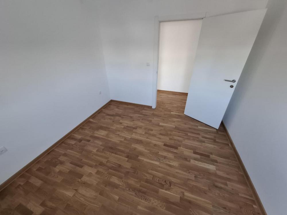 Slika 11 - NOV Četvoroiposoban stan Telep