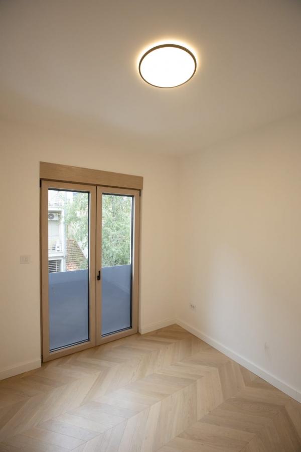 Slika 11 - Četvorosoban stan sa parking mestom u Centru.