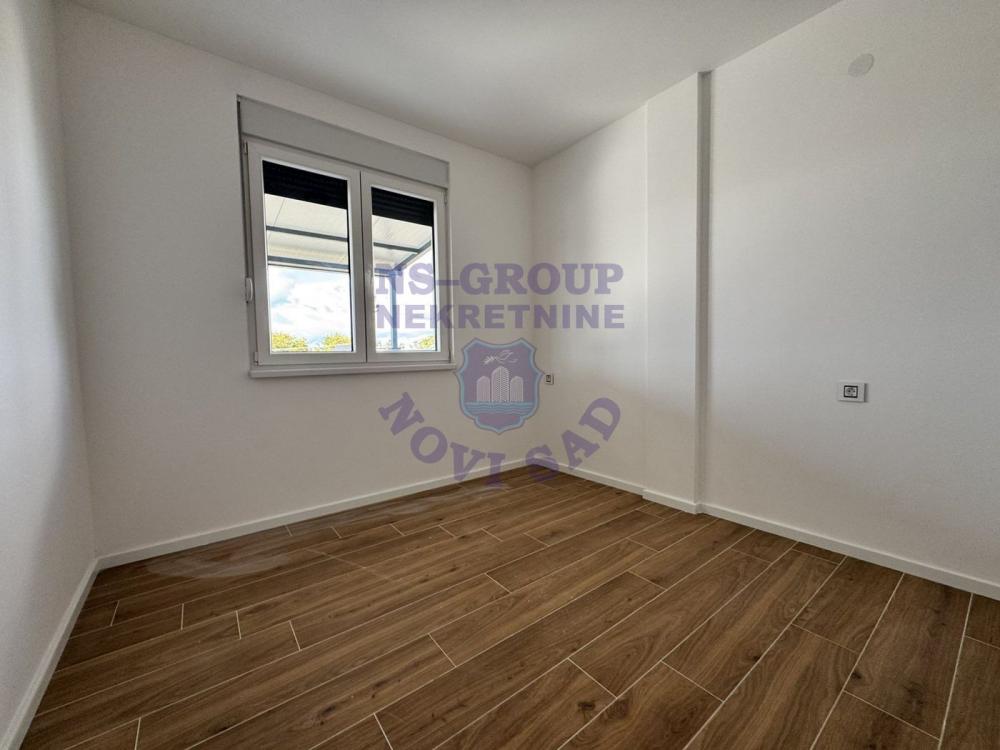 Slika 3 - 557775-Predstavljamo Vam fenomenalan stan na vrhunskoj lokaciji u Veterniku - Centar!