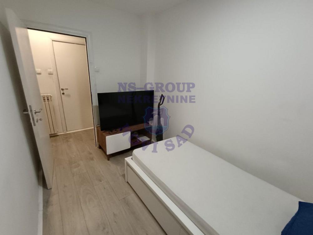 Slika 8 - Prelep dvoiposoban stan na Novom Naselju!