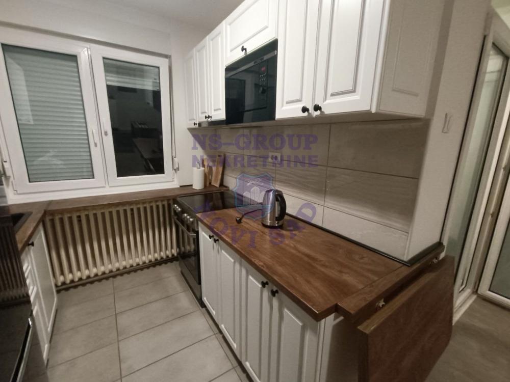 Slika 8 - Odlican dvoiposoban stan na Novom Naselju 