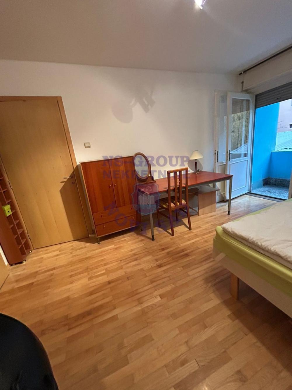 Slika 7 - Odlican dvosoban stan u Centru!