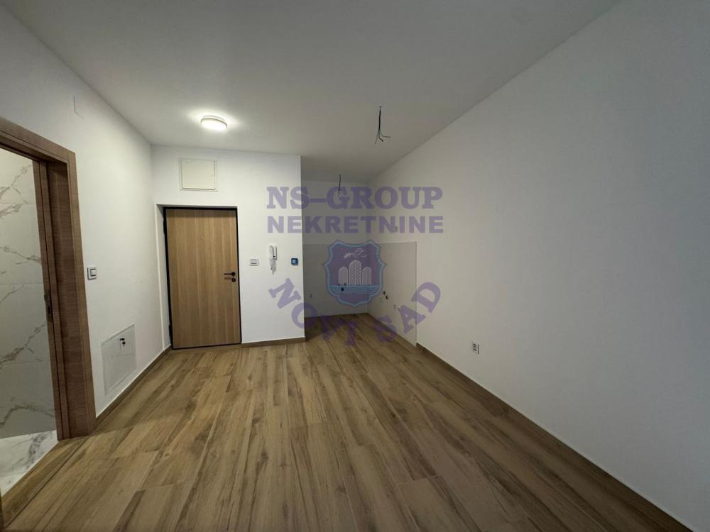 Slika 1 - 565856-Na prodaju je potpuno nova garsonjera od 27 m², smeštena na prizemlju moderne zgrade u samom centru Novog Sada.