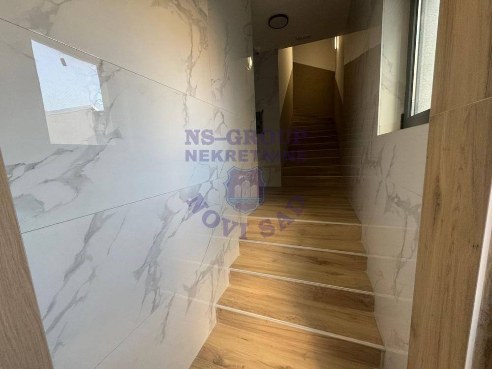 Slika 5 - 565856-Na prodaju je potpuno nova garsonjera od 27 m², smeštena na prizemlju moderne zgrade u samom centru Novog Sada.