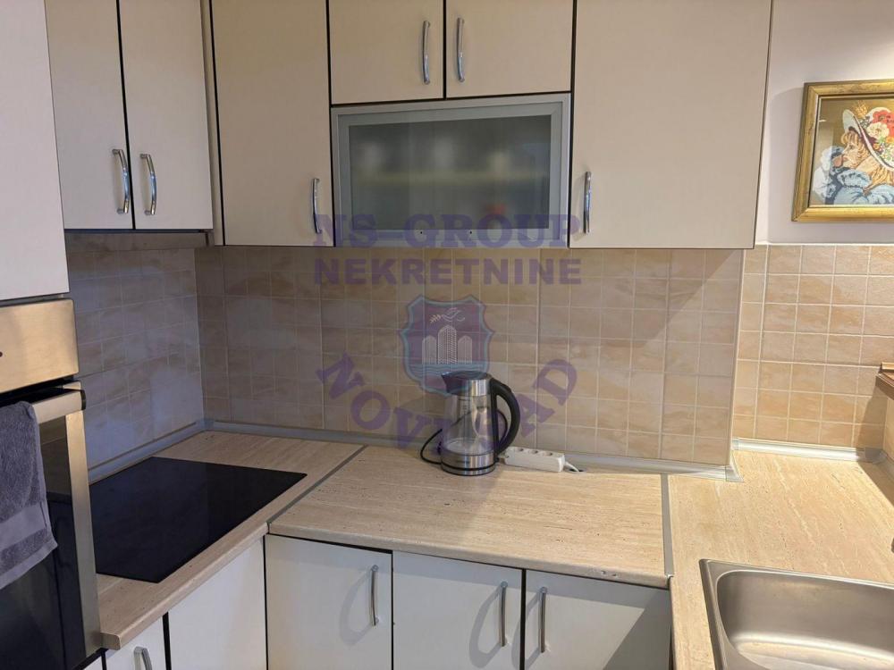 Slika 6 - Porodičan stan komforan i funkcionalan!