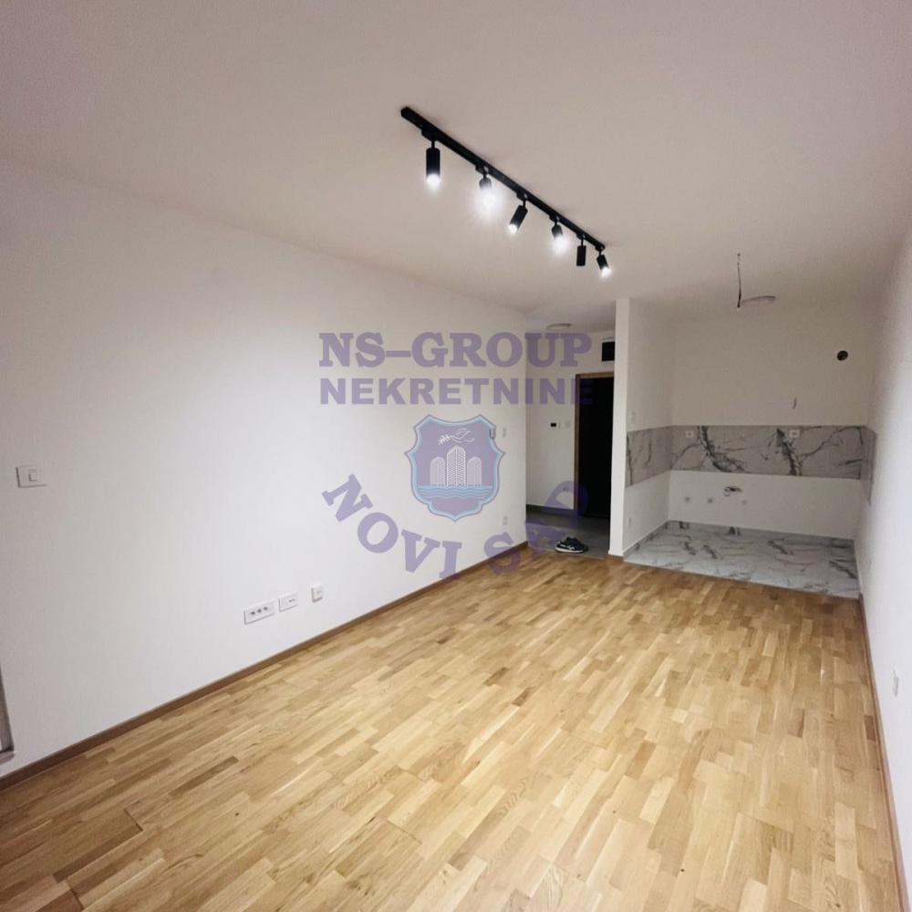 Glavna slika -Funkcionalan dvosoban stan na Avijaciji u novoj zgradi!