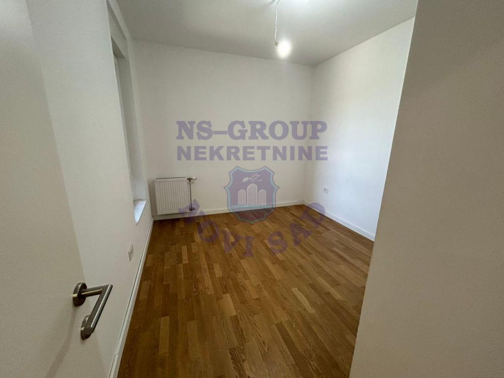 Slika 4 - Odlican dvosoban stan na Novom Naselju!