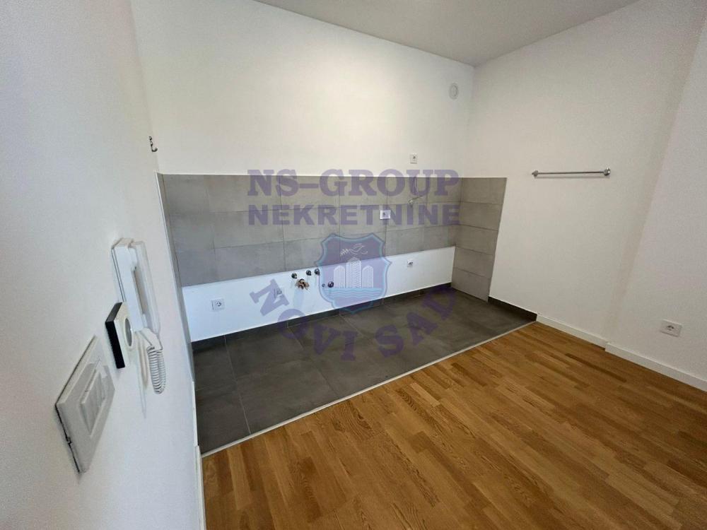 Glavna slika -Odlican dvosoban stan na Novom Naselju!