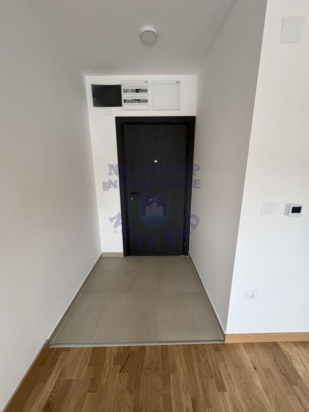 Slika 7 - Izuzetno svetao nov stan u Petrovaradinu!