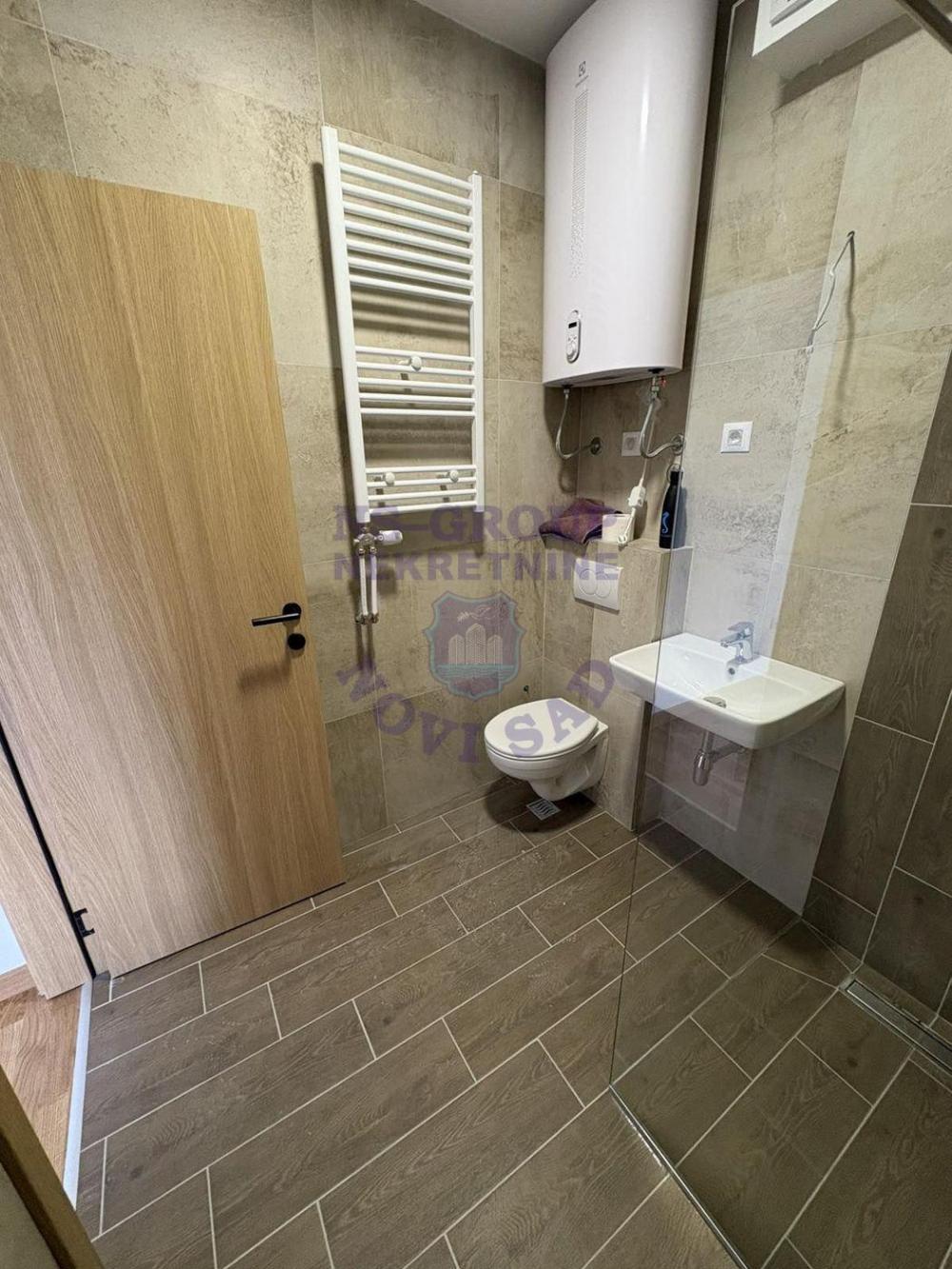 Slika 9 - Izuzetno svetao nov stan u Petrovaradinu!