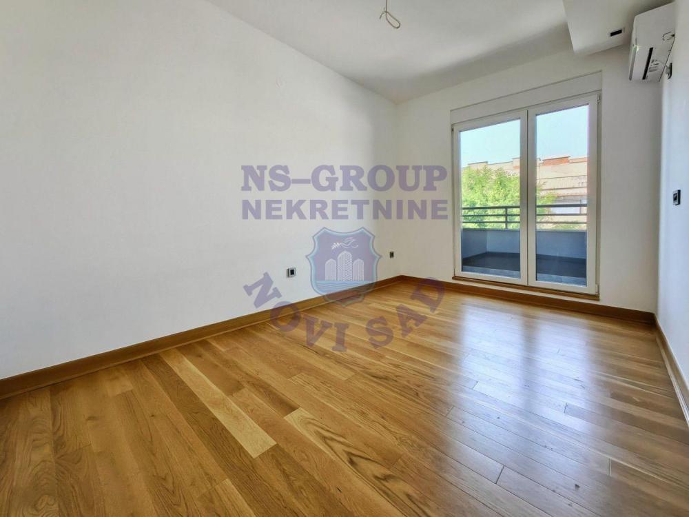Slika 5 - Četvorosoban, 240m2, Adamovićevo naselje Novi Sad, sa terasom, ima lift