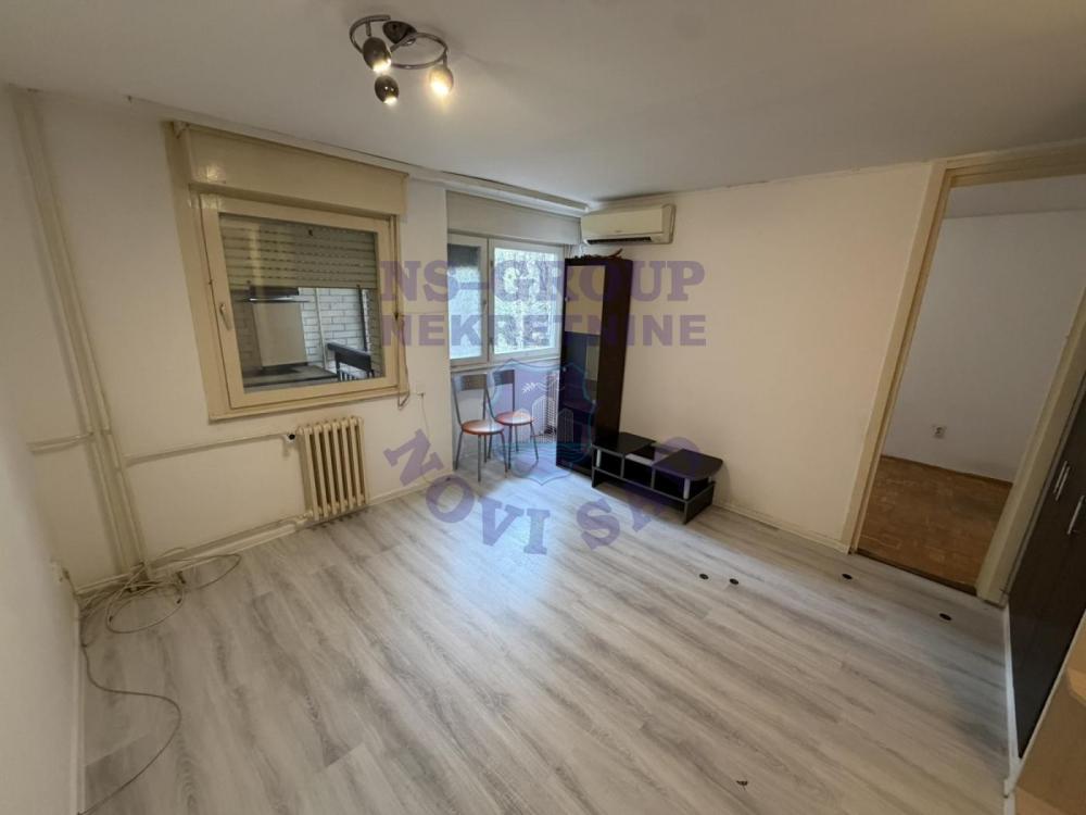 Slika 0 - Komforan trosoban stan na Novom Naselju.